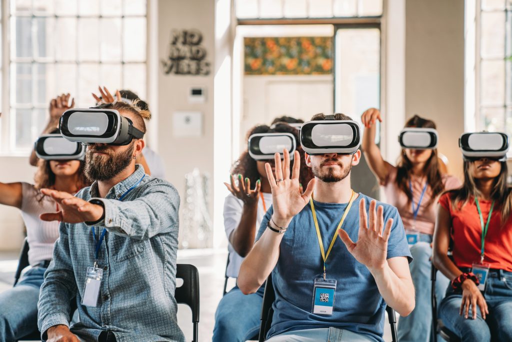 Group of people using virtual reality headsets during a workshop.