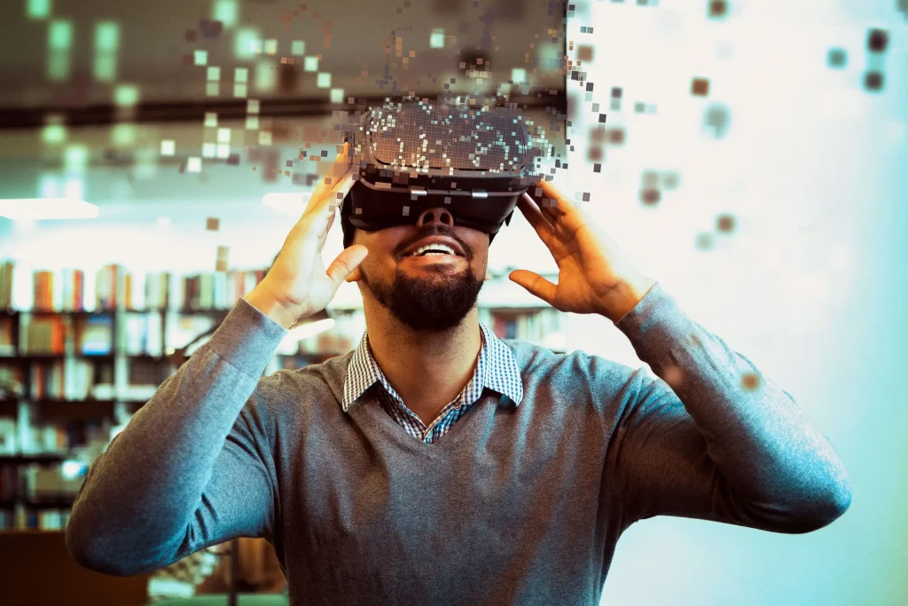 A man experiencing virtual reality, with digital pixels emanating from the vr headset.